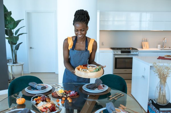 How does having a designated snack zone in the kitchen help in weight loss?
